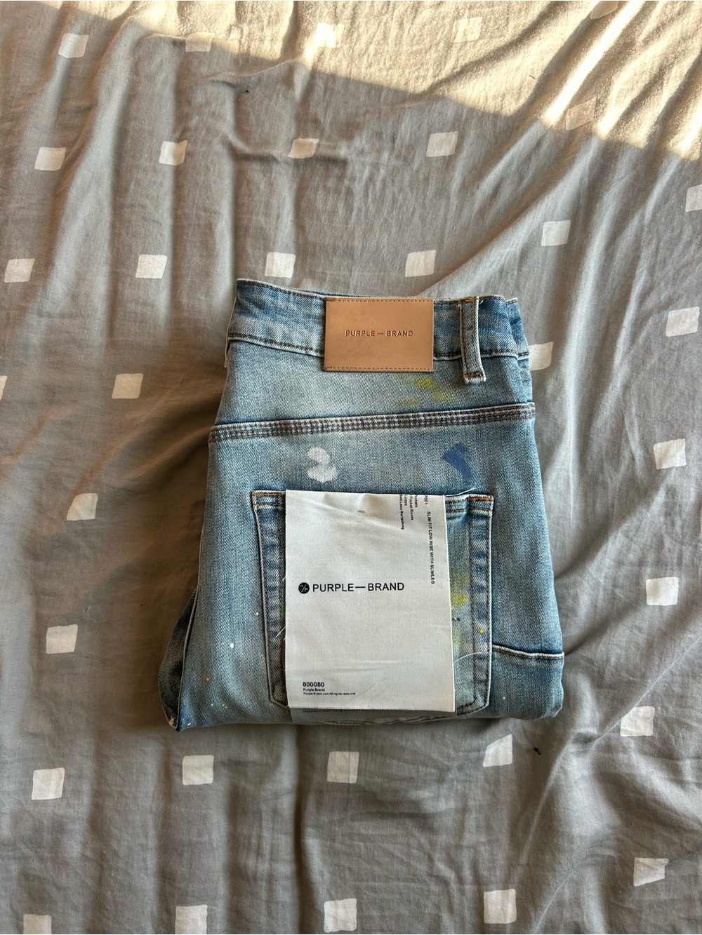 Purple Brand Men’s Light Blue Slim Jeans with Subtle Paint Detail